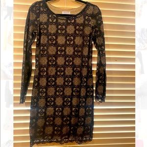 Size small black lace dress. Maybe worn once.